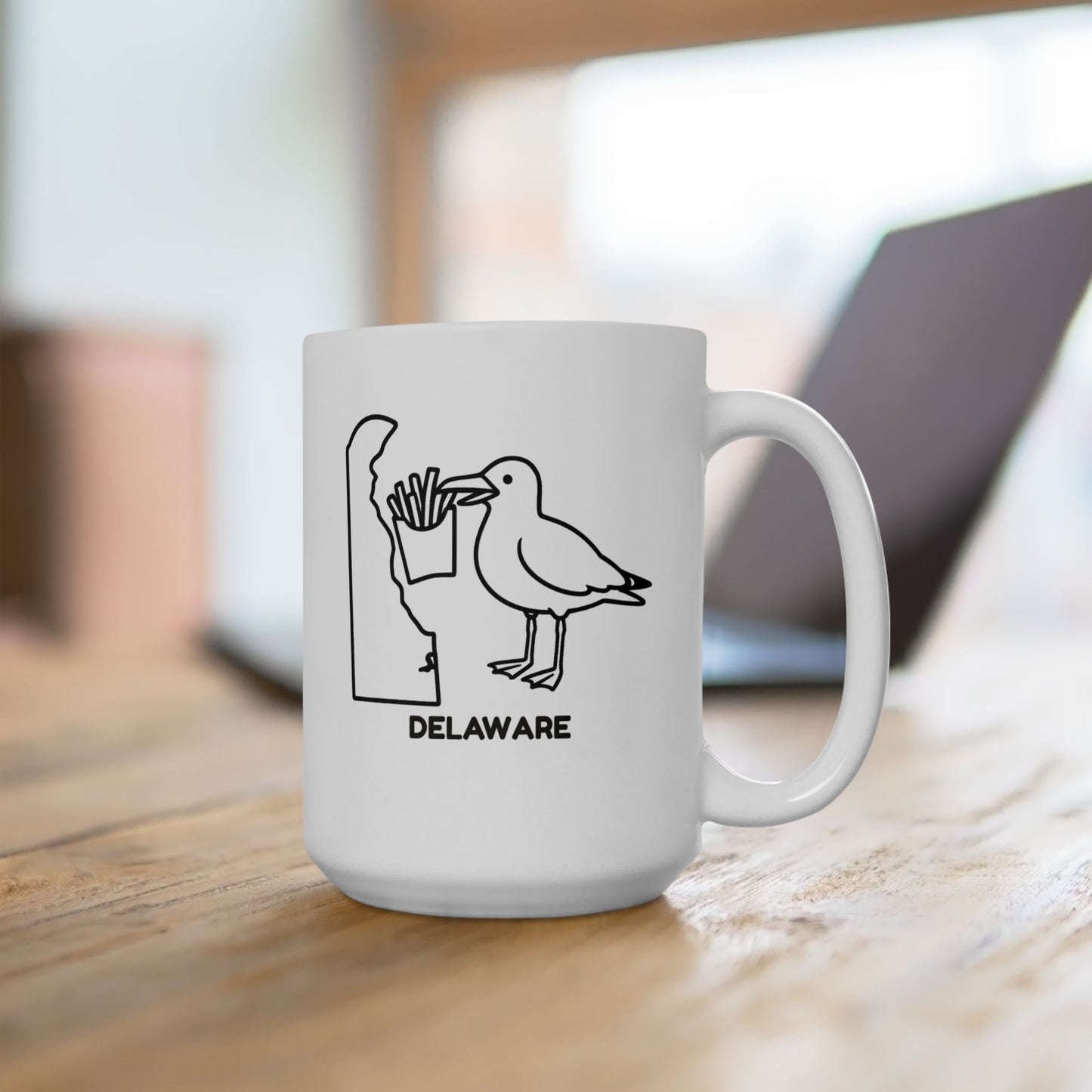 "Delaware: Where the most dangerous thing is a seagull stealing your fries." Ceramic Mug - 14125