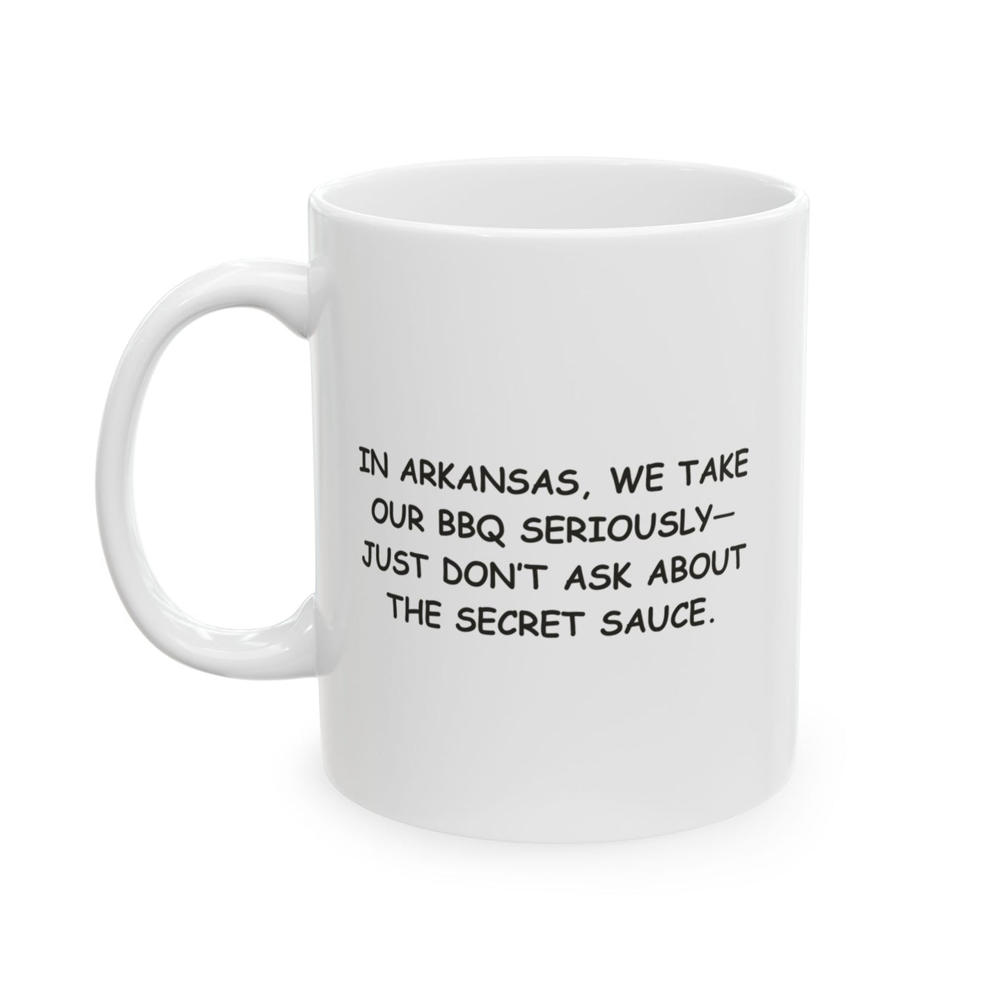 "In Arkansas, we take our BBQ seriously—just don’t ask about the secret sauce." Ceramic Mug - 13344
