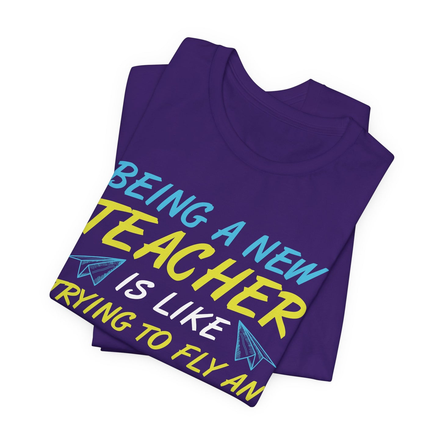 Being A New Teacher Is Like Trying  To Fly An Airplane While Building It - Unisex Jersey Short Sleeve Tee