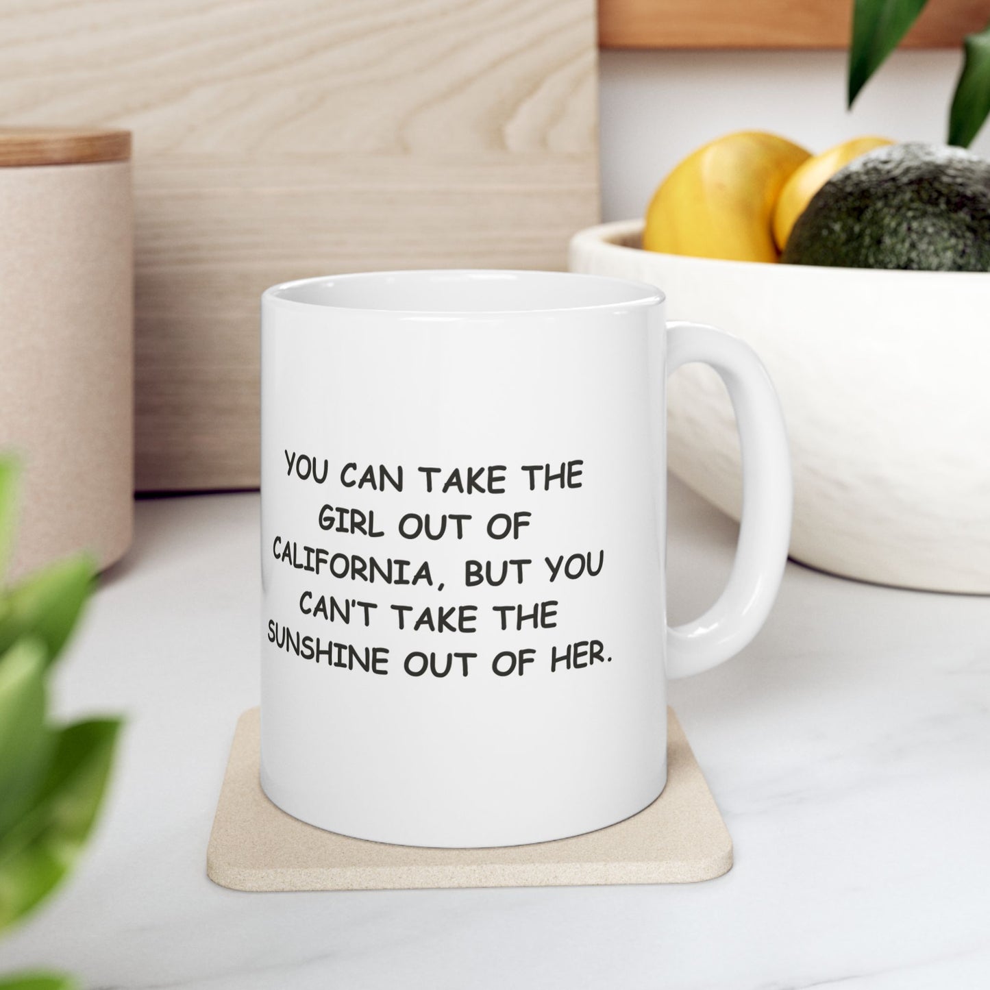 "You can take the girl out of California, but you can’t take the sunshine out of her." Ceramic Mug - 11oz & 15oz - 12722
