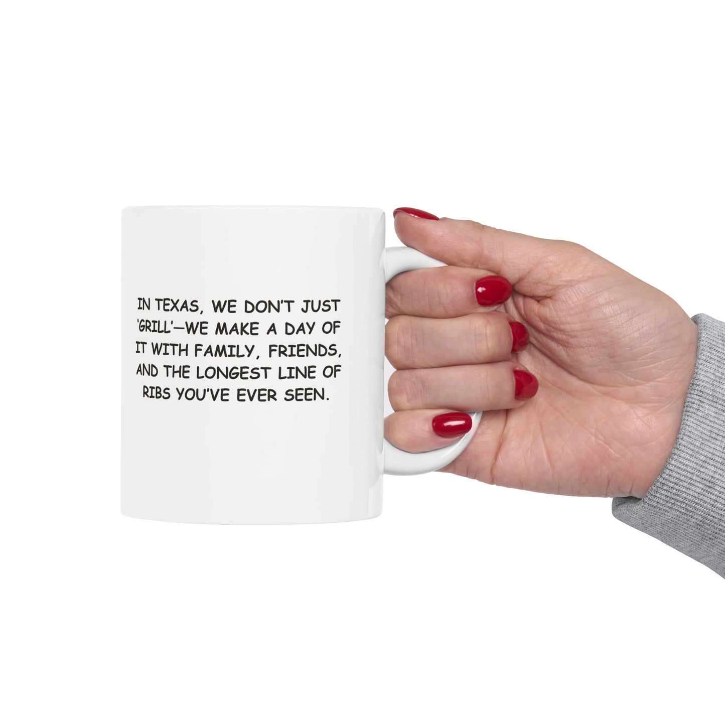 "In Texas, we don’t just ‘grill’—we make a day of it with family, friends, and the longest line of ribs you’ve ever seen." Ceramic Mug - 12752