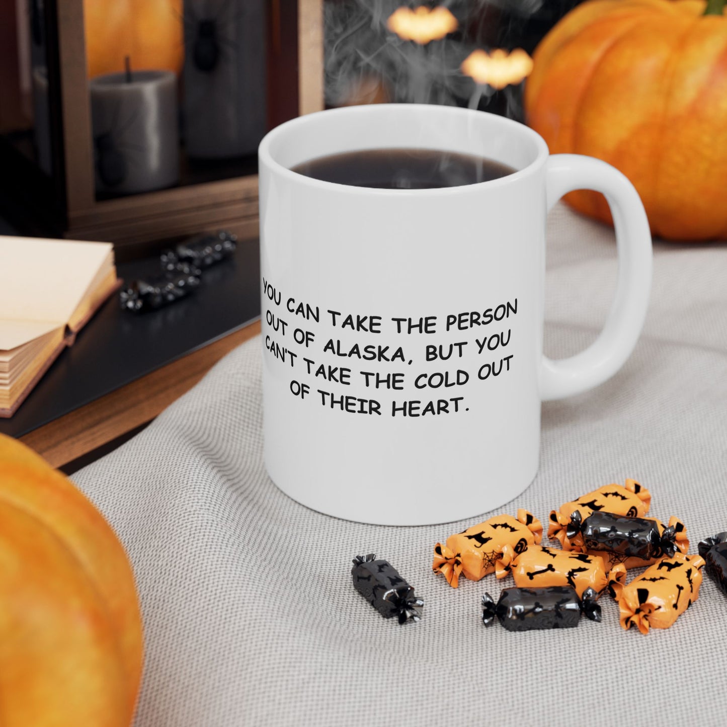 "You can take the person out of Alaska, but you can’t take the cold out of their heart." Ceramic Mug - 13013