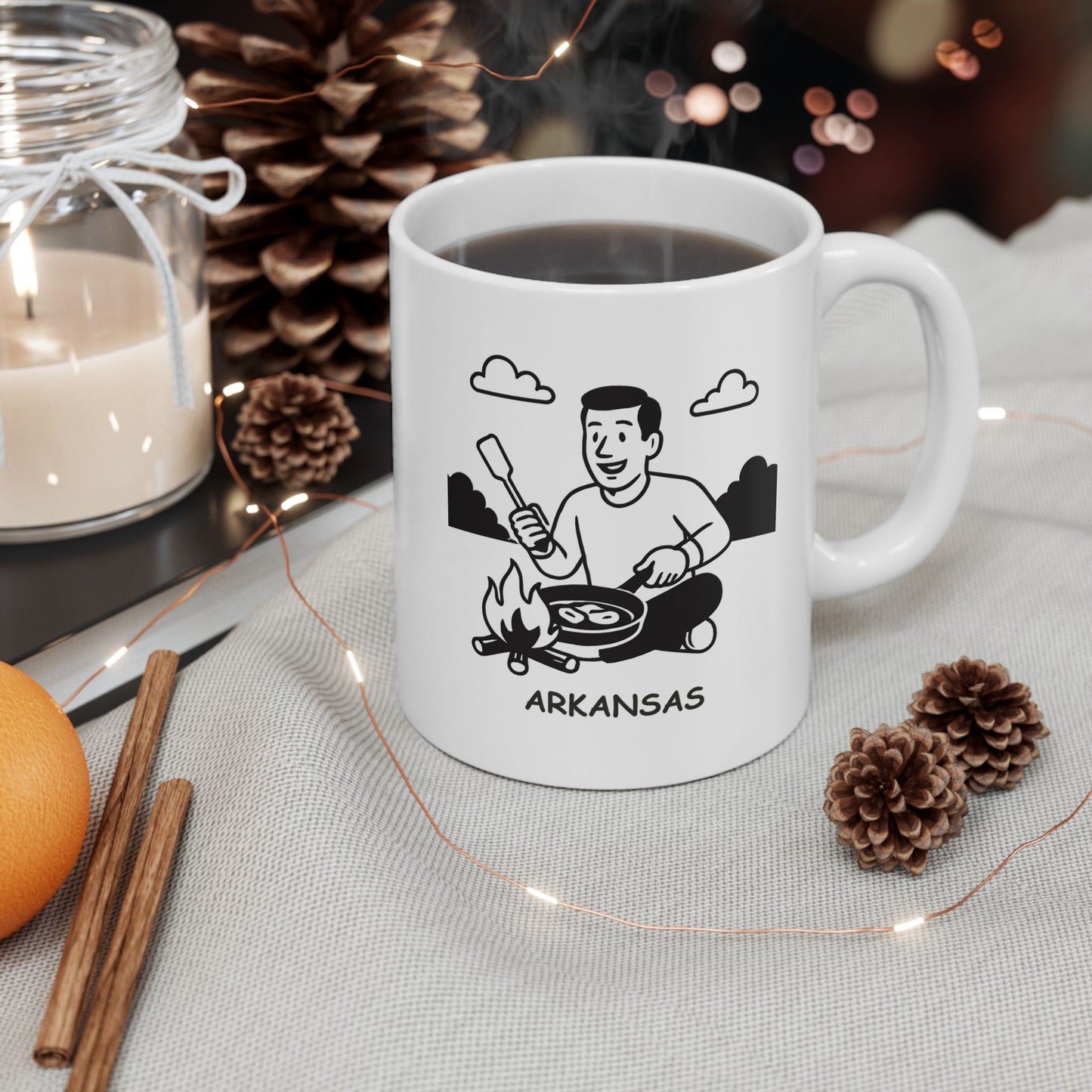 "In Arkansas, we don’t need a fancy restaurant; we just need a campfire and a skillet." Ceramic Mug - 13328