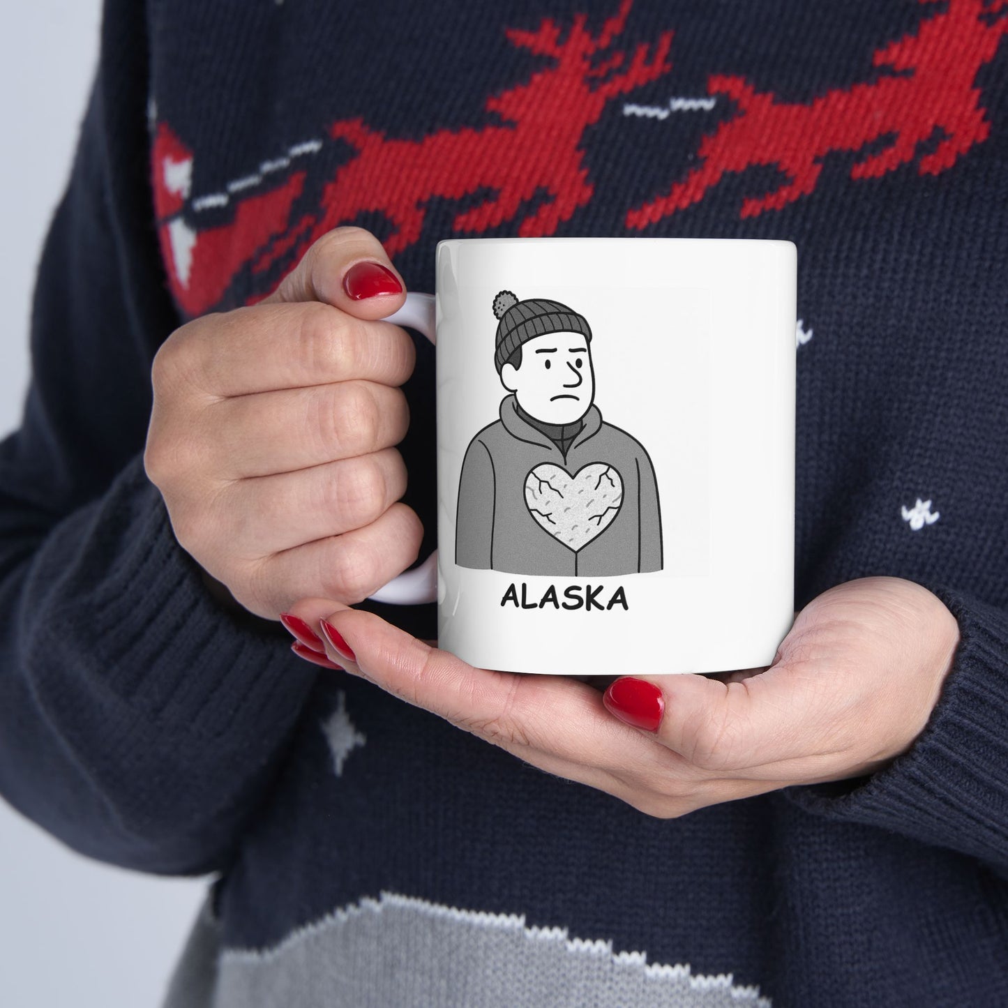 "You can take the person out of Alaska, but you can’t take the cold out of their heart." Ceramic Mug - 13013
